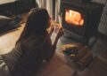 woman, fireplace, coffee cup-6795381.jpg