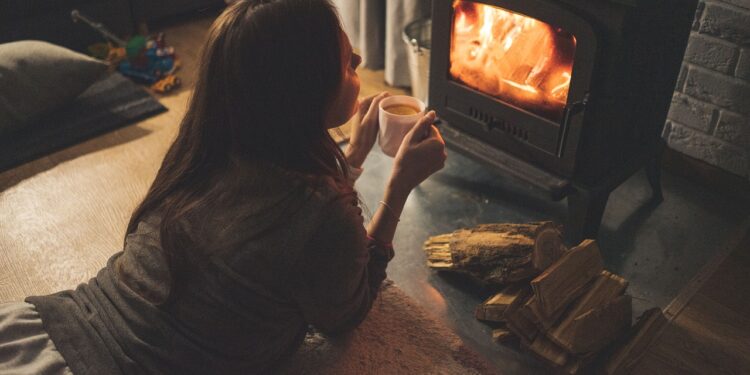 woman, fireplace, coffee cup-6795381.jpg
